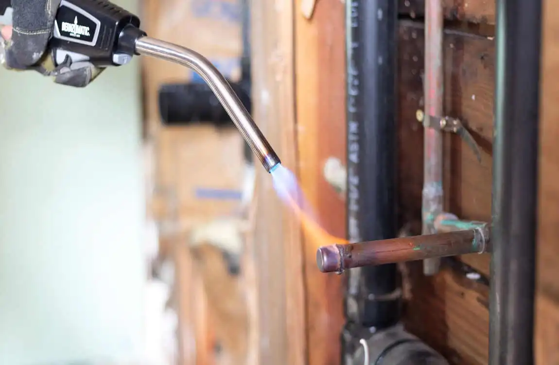 what temp does house plumbing solder melt